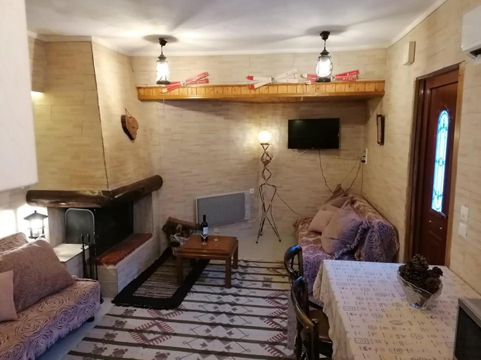 Televízia a/alebo spoločenská miestnosť v ubytovaní Mountain Memories