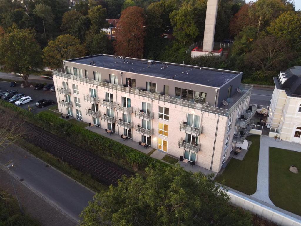 an aerial view of a large white building at BeachSide in Eckernförde