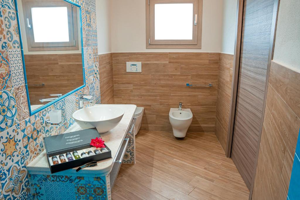 Koupelna v ubytování AQUA SARDINIA boutique hotel