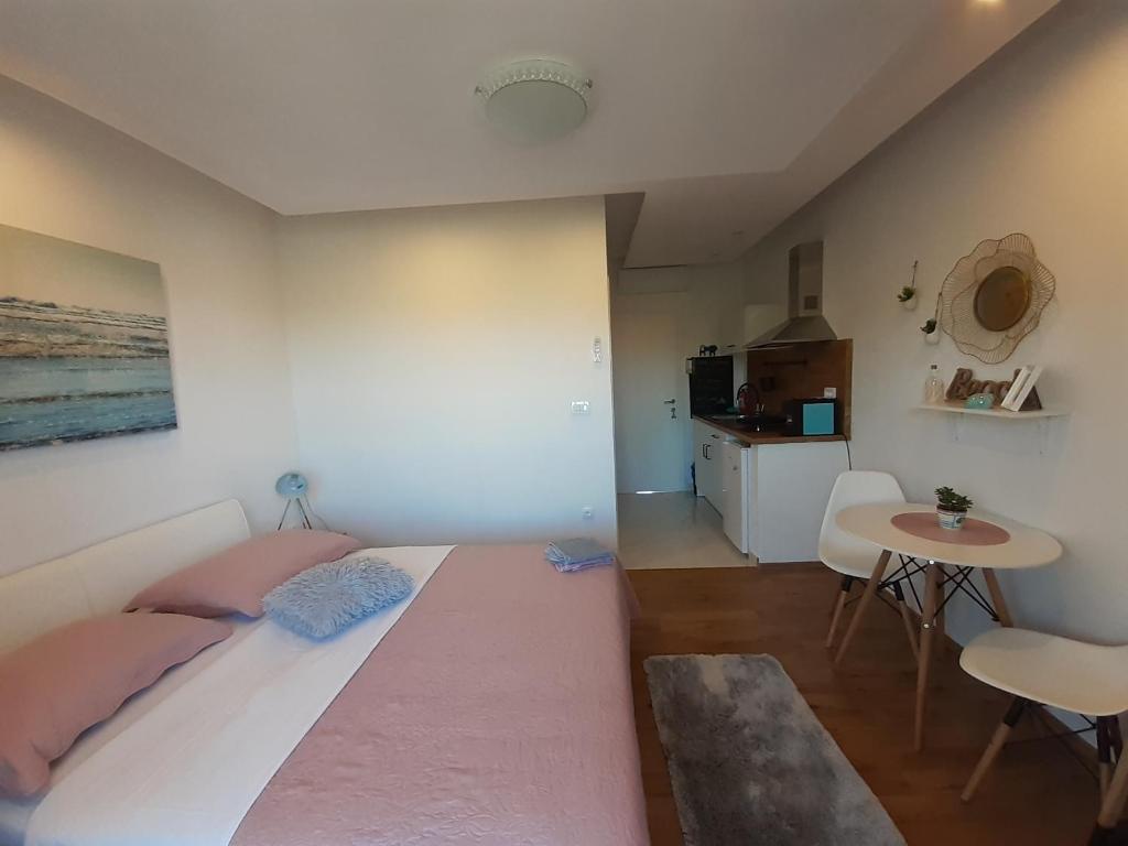 Postel nebo postele na pokoji v ubytování Barko apartment and rooms