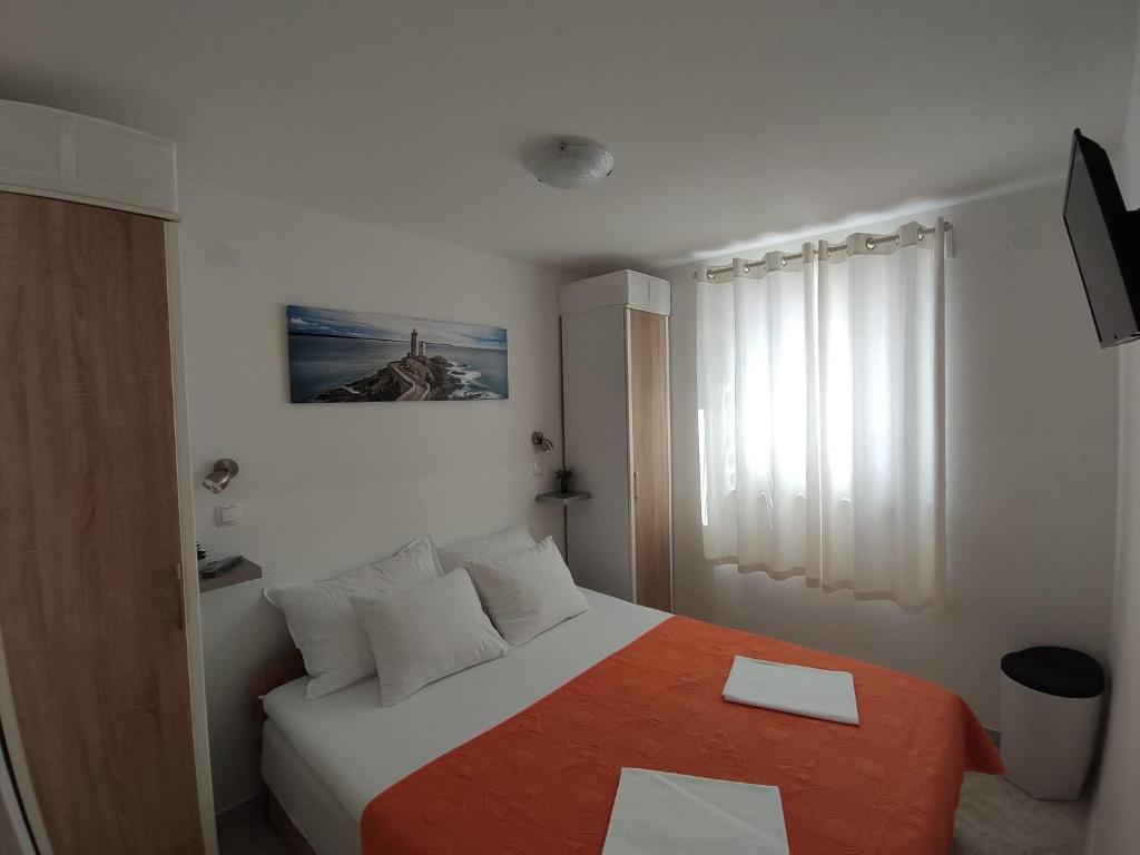 Postel nebo postele na pokoji v ubytování Apartman Mare Vir