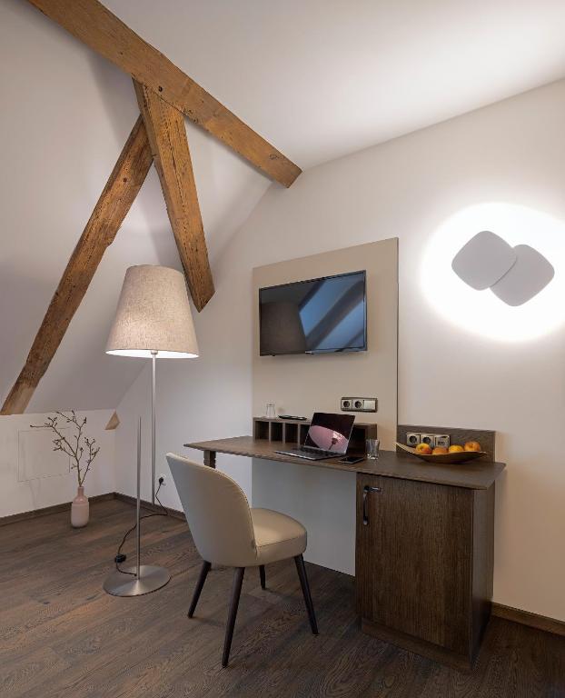 TV a/nebo společenská místnost v ubytování Altstadthotel der Patrizier