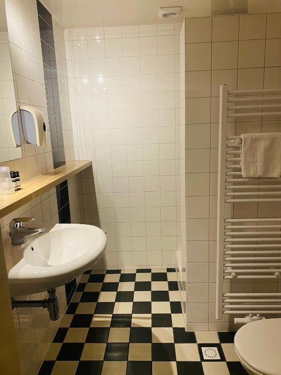 Koupelna v ubytování Hotel Restaurant 'de Vossenberg'