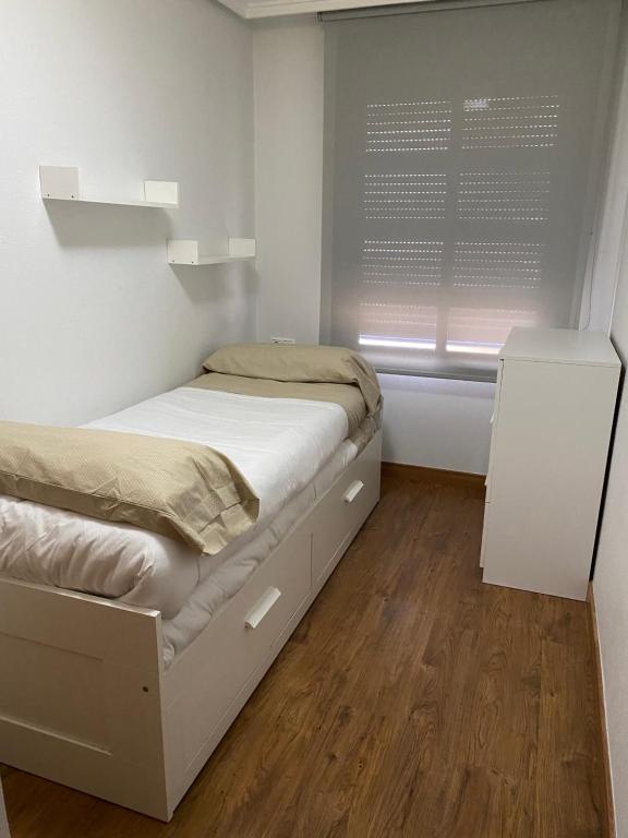Posteľ alebo postele v izbe v ubytovaní TORREVIEJA