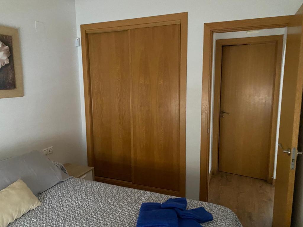 Posteľ alebo postele v izbe v ubytovaní TORREVIEJA