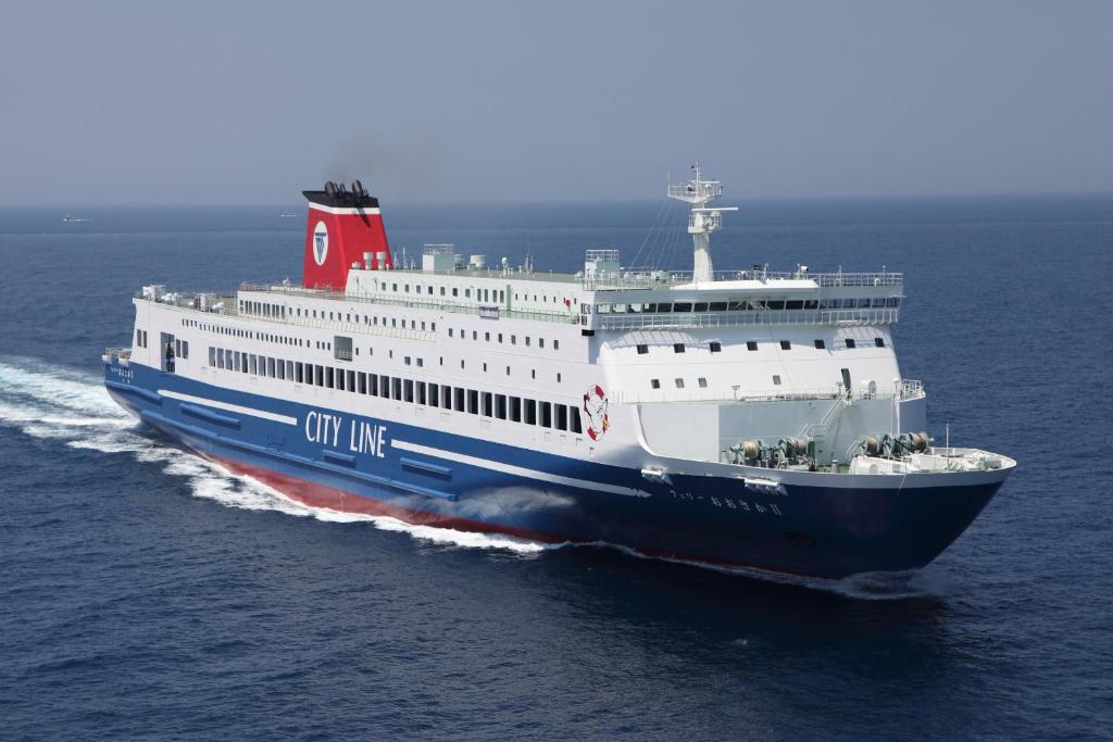a large cruise ship in the water at Meimon Taiyo Ferry 1st sailing from Kitakyushu to Osaka in Kitakyushu