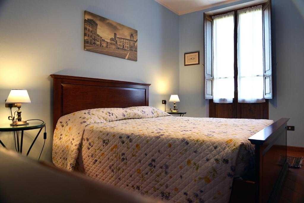 Postel nebo postele na pokoji v ubytování Podere Del Griccia