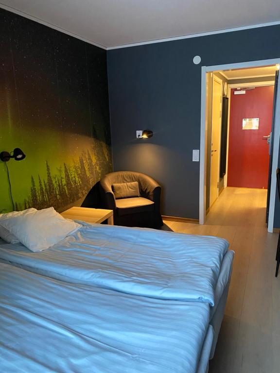 Postel nebo postele na pokoji v ubytování Hotell Smedjan