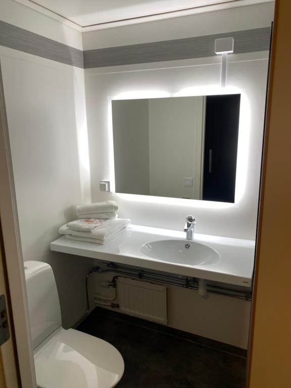 Koupelna v ubytování Hotell Smedjan