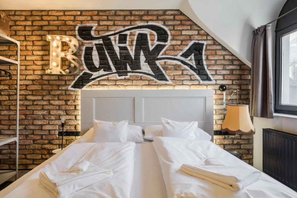 Posteľ alebo postele v izbe v ubytovaní Butik Apartments, by BQA