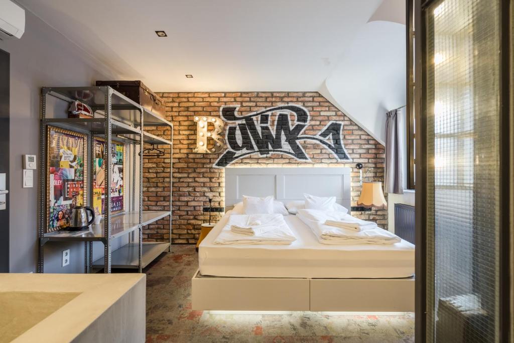Posteľ alebo postele v izbe v ubytovaní Butik Apartments, by BQA