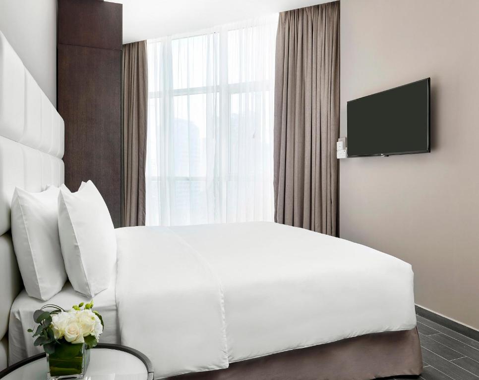 TV a/nebo společenská místnost v ubytování Staybridge Suites - Doha Lusail by IHG