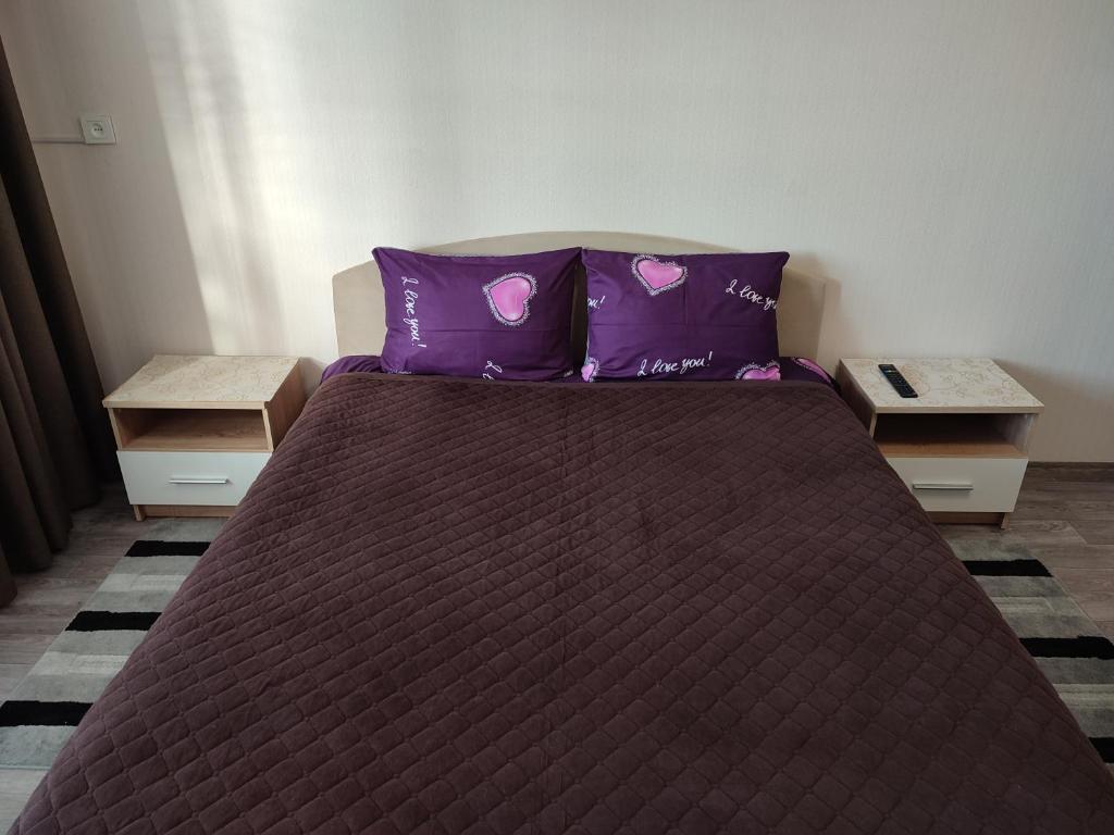 Cama o camas de una habitación en Аренда квартиры