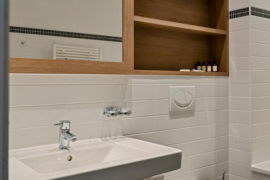 Koupelna v ubytování Hotel Astoria