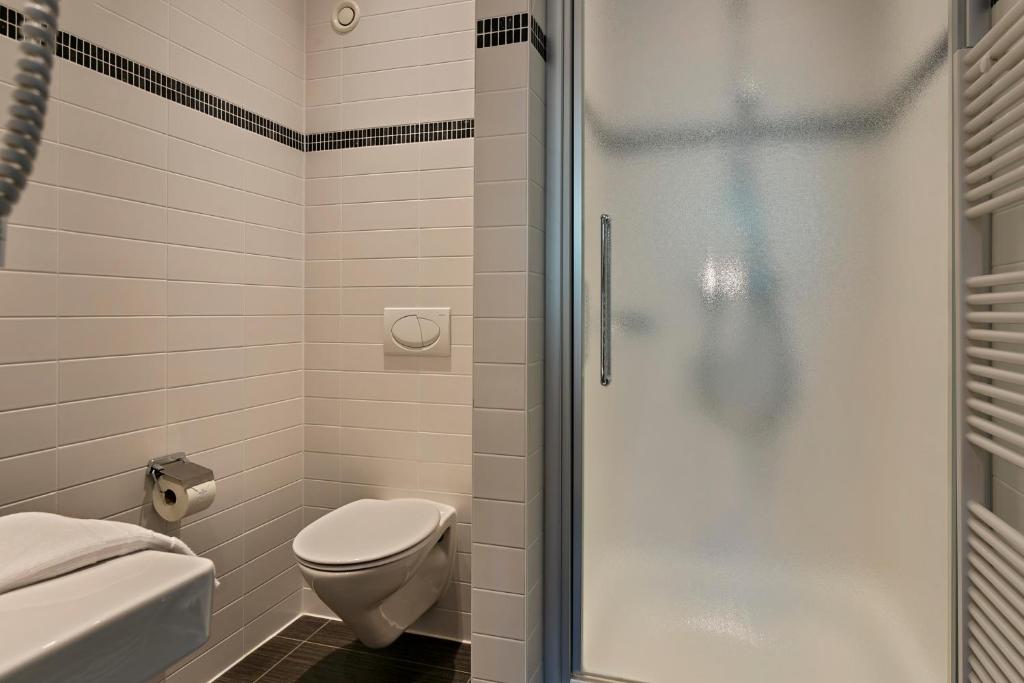 Koupelna v ubytování Hotel Astoria