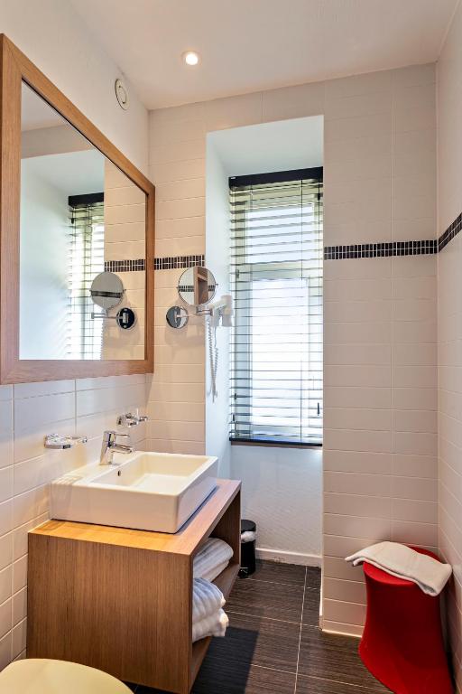 Koupelna v ubytování Hotel Astoria