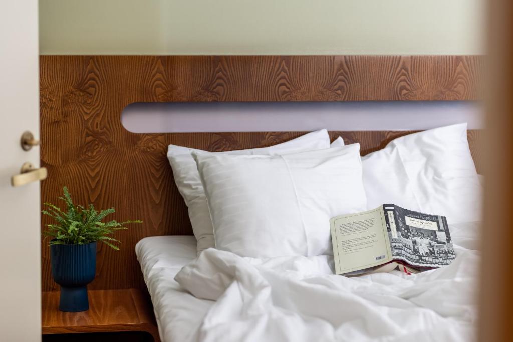 Voodi või voodid majutusasutuse Hotel Soho toas