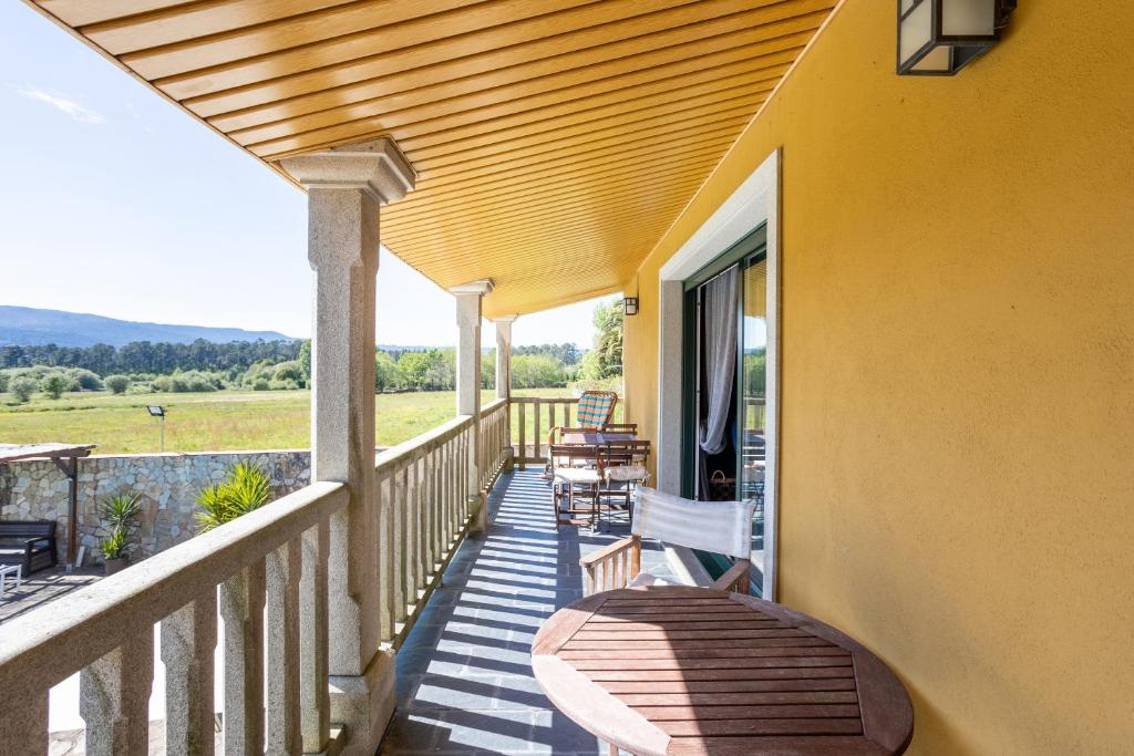 Balkón nebo terasa v ubytování LE LLAR casa con 2 PISCINAS 1 CLIMATIZADA INTERIOR muy cerca de Santiago de Compostela