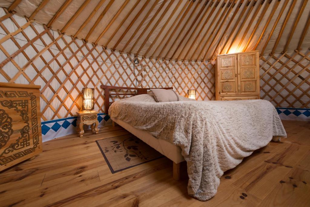 Postel nebo postele na pokoji v ubytování Domaine Arvor & Spa