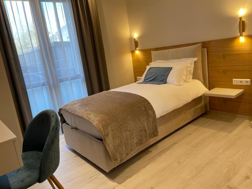 Voodi või voodid majutusasutuse Albergo Aida toas