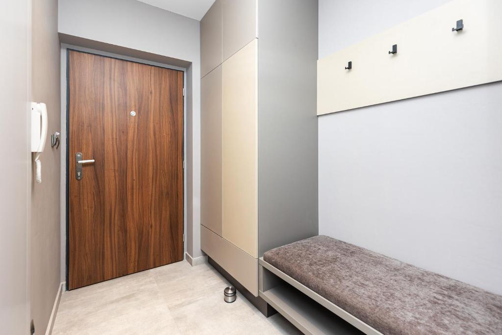 Postel nebo postele na pokoji v ubytování Apartmány U Vinice