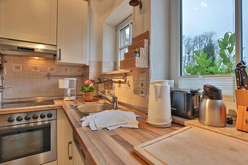 Kuchyň nebo kuchyňský kout v ubytování Residenz Ostseestrand Appartement 3