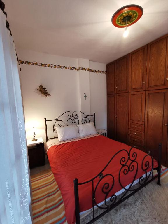 A bed or beds in a room at Archontiko Elena