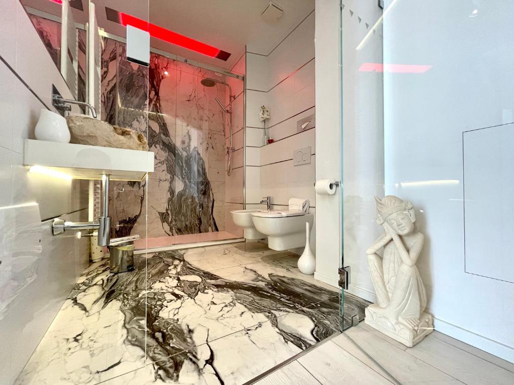 Kúpeľňa v ubytovaní Mariarosa Suites