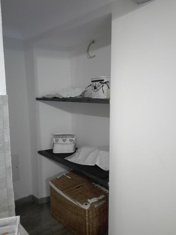Posteľ alebo postele v izbe v ubytovaní bilocale con il mare dentro