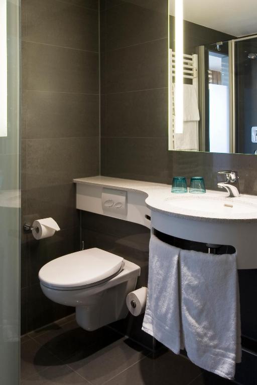 Koupelna v ubytování Hotel Viva Sky