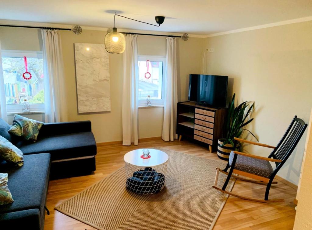 TV a/nebo společenská místnost v ubytování Haus am See
