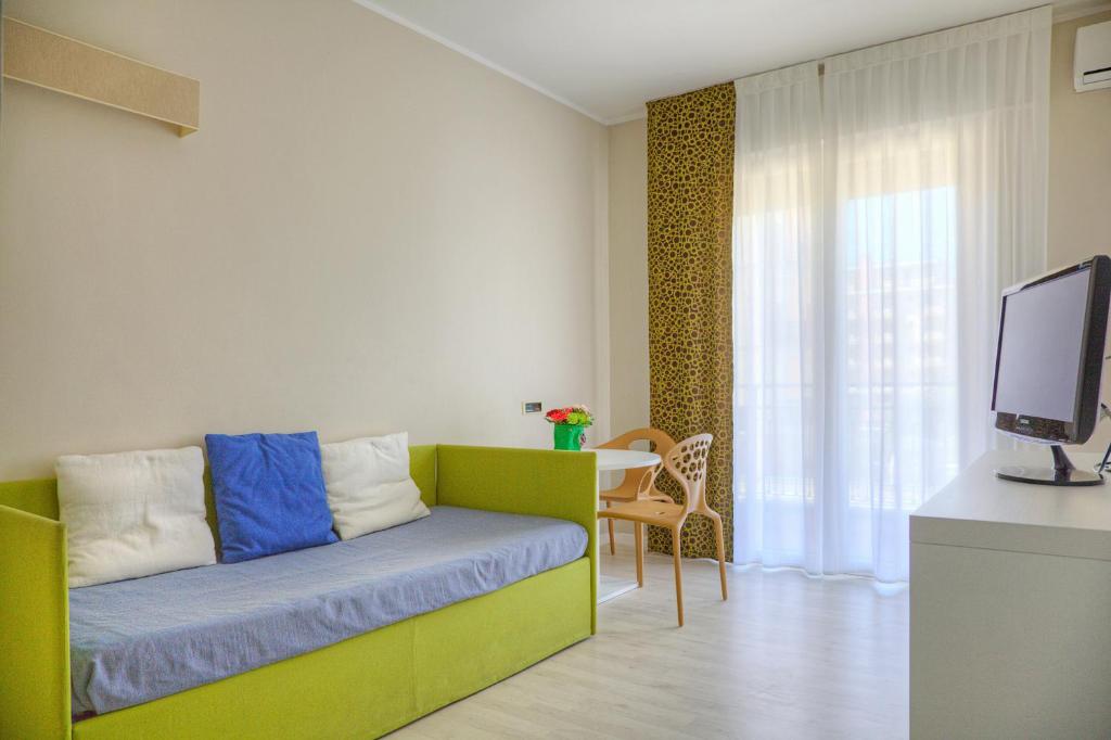 TV a/nebo společenská místnost v ubytování Ute Hotel