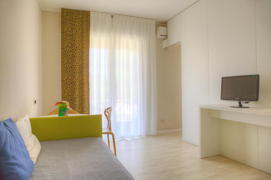 TV a/nebo společenská místnost v ubytování Ute Hotel