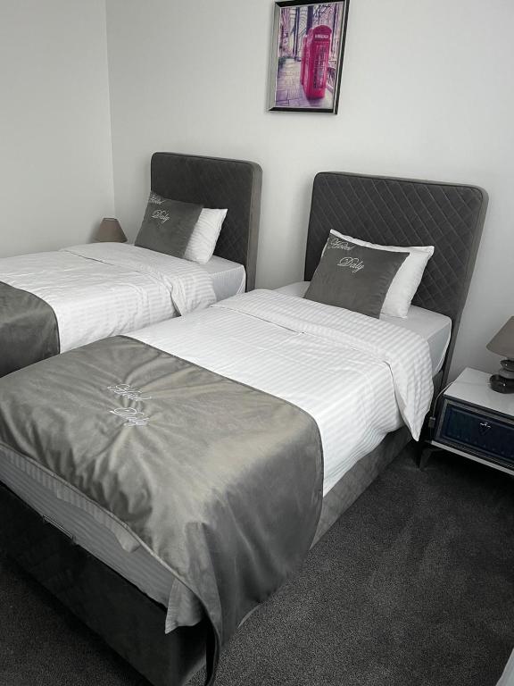 Postel nebo postele na pokoji v ubytování Hotel Daly