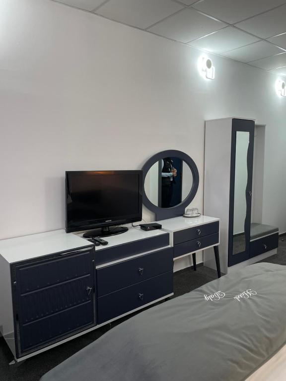 TV a/nebo společenská místnost v ubytování Hotel Daly