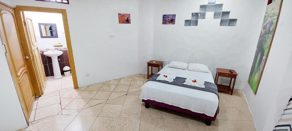 Postel nebo postele na pokoji v ubytování Hotel Crossman