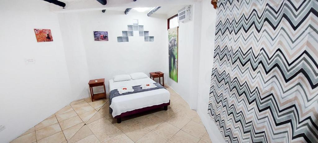 Postel nebo postele na pokoji v ubytování Hotel Crossman