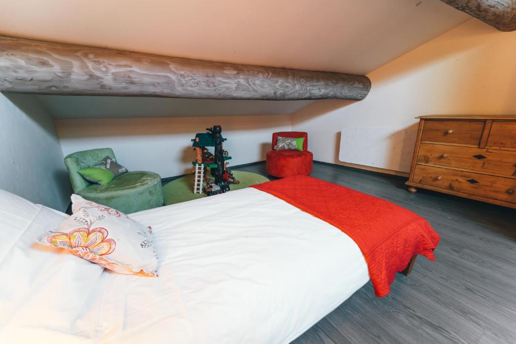 Postel nebo postele na pokoji v ubytování Gîte de Beauregard - Les Fermes Ardéchoises