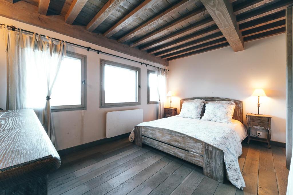 Postel nebo postele na pokoji v ubytování Gîte de Beauregard - Les Fermes Ardéchoises