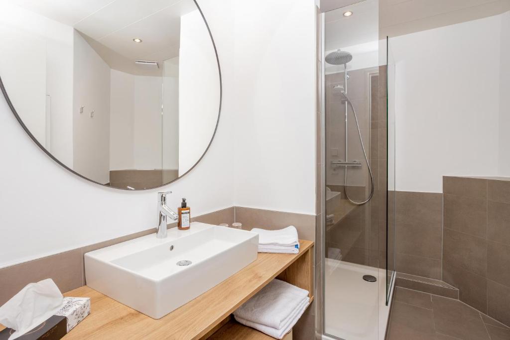 Koupelna v ubytování maakt Hotel