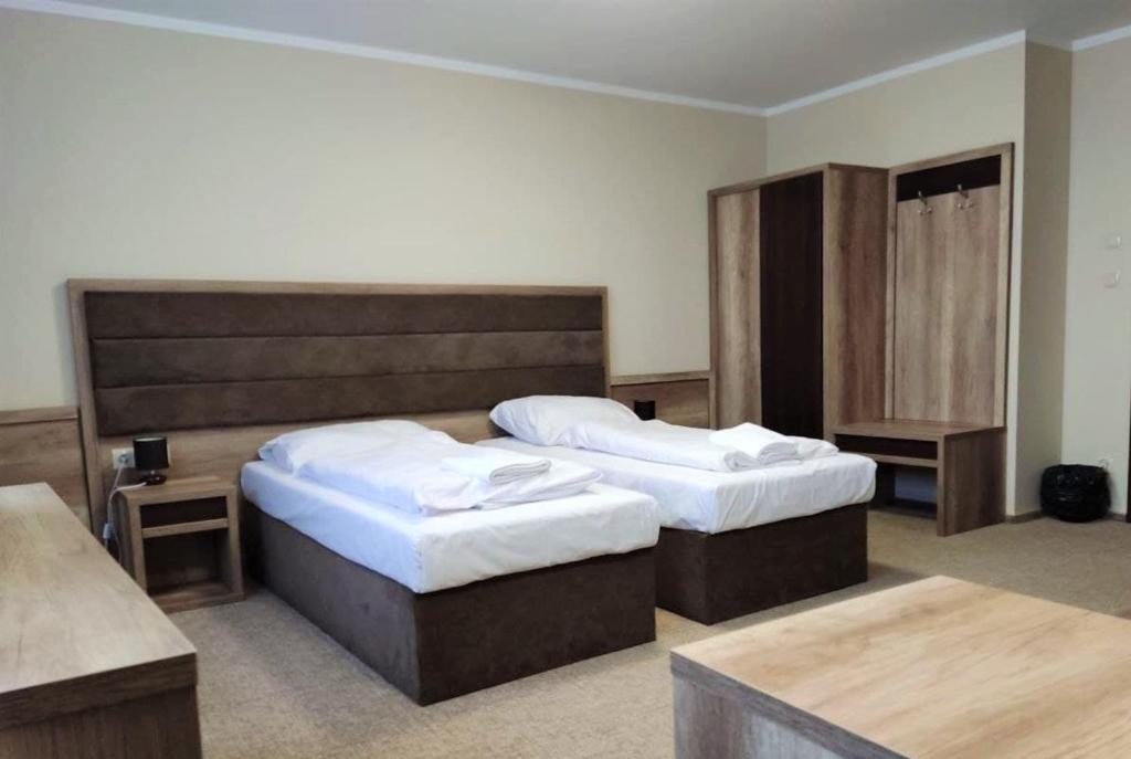 Postel nebo postele na pokoji v ubytování Hotel Cargo