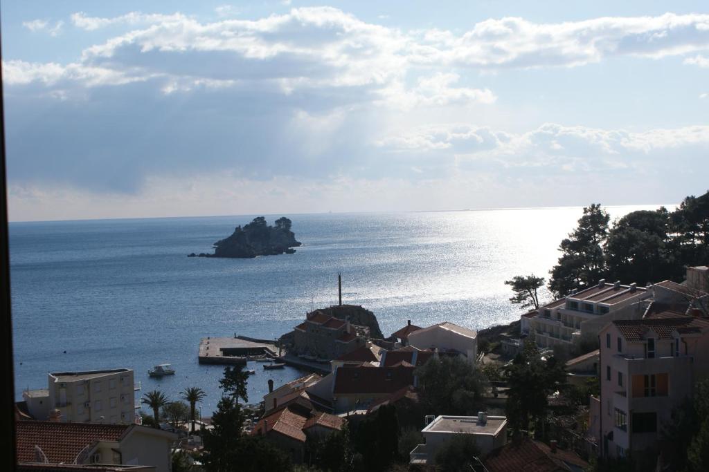 a view of the ocean from a city at Engora 5 in Petrovac na Moru