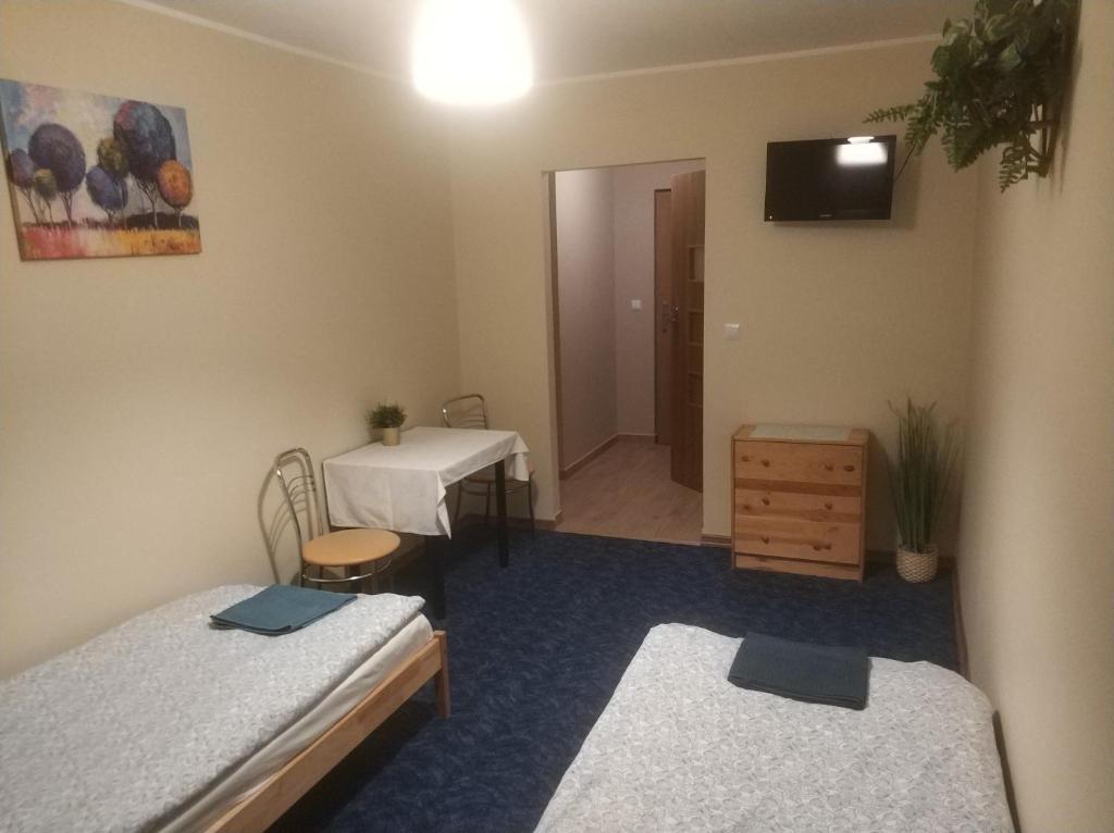 Postel nebo postele na pokoji v ubytování Hotel Mark