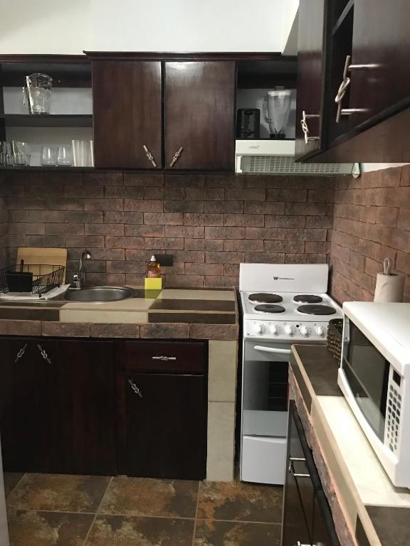 Kuchyň nebo kuchyňský kout v ubytování Casas del Toro Playa Flamingo