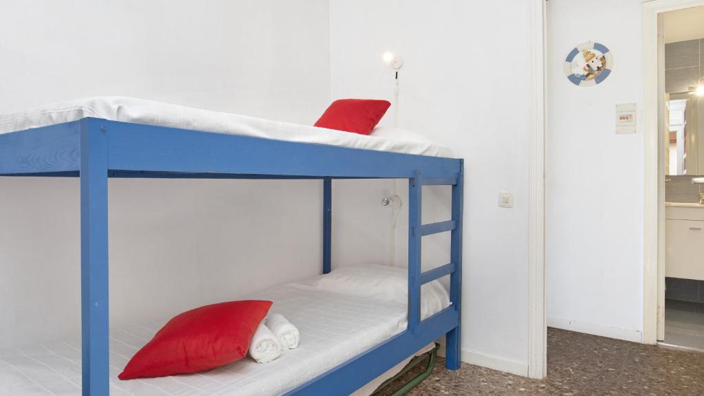Postel nebo postele na pokoji v ubytování 1 LLUM01 - Llafranc