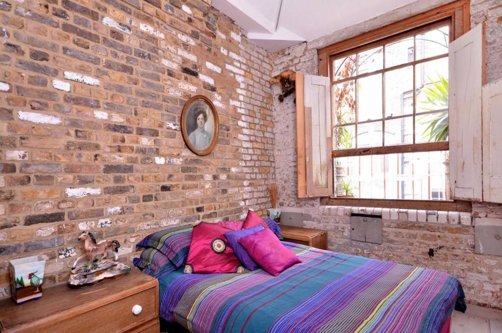 En eller flere senge i et værelse på The Framerys