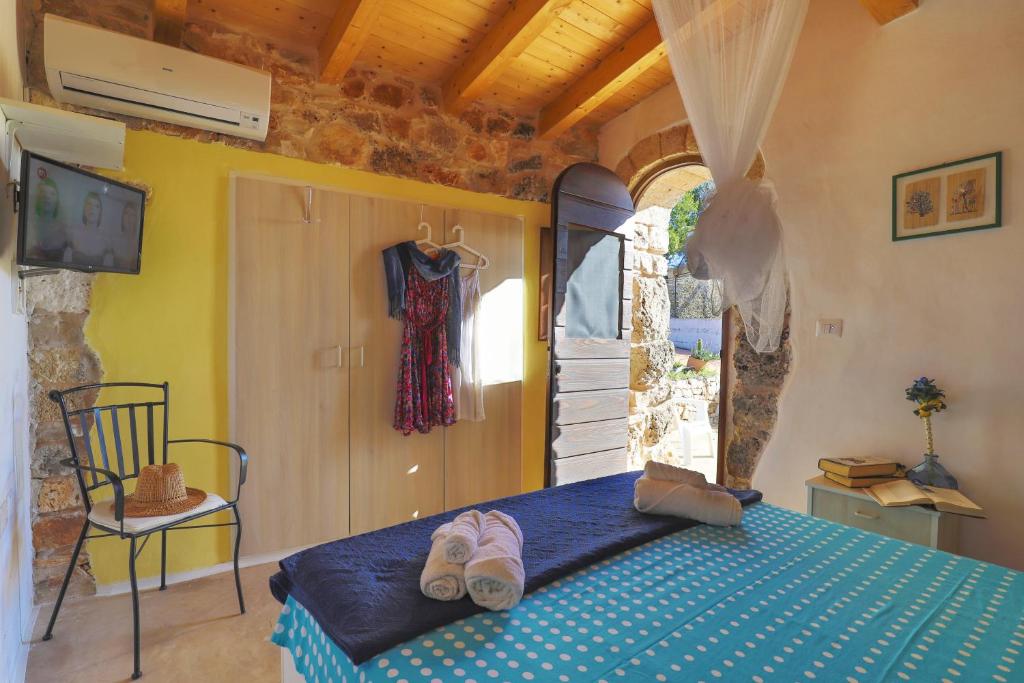 Postel nebo postele na pokoji v ubytování Romantica Liama Piccola