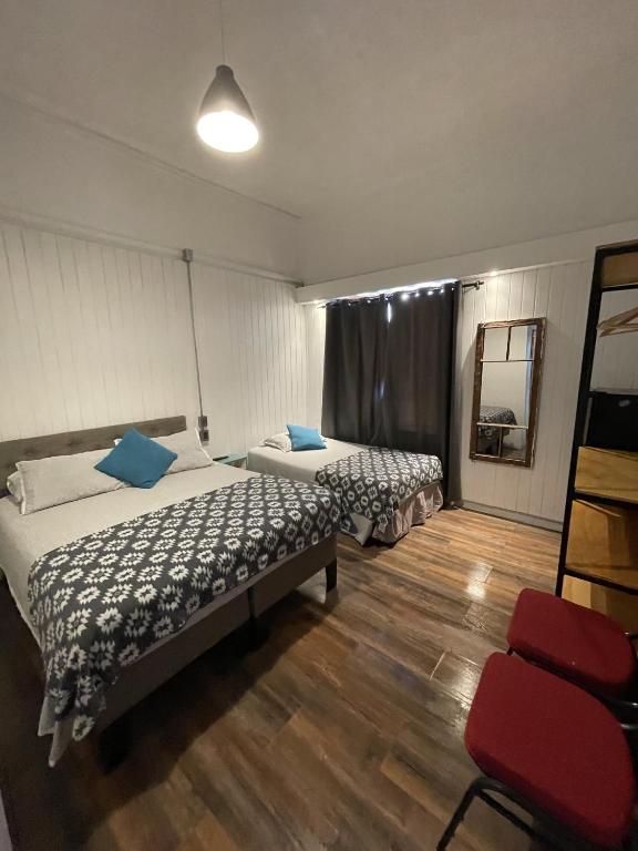 Postel nebo postele na pokoji v ubytování VOY Hostales - Poniente