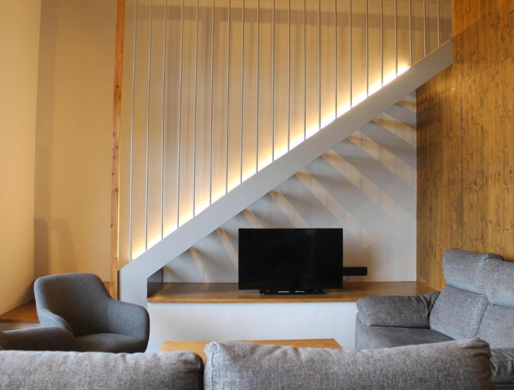 TV a/nebo společenská místnost v ubytování Apartament "El Castell" Casa Rural Cal Rialla