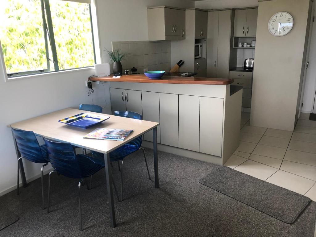 Kuchyň nebo kuchyňský kout v ubytování Beachpoint Apartments